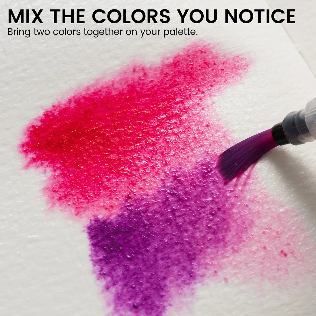 Water brush blending pink and purple watercolor washes on paper