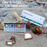 FUNTO watercolor tube set with wooden palettes beside a rocky stream