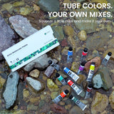 FUNTO watercolor paint tubes and their box arranged on rocks beside flowing water